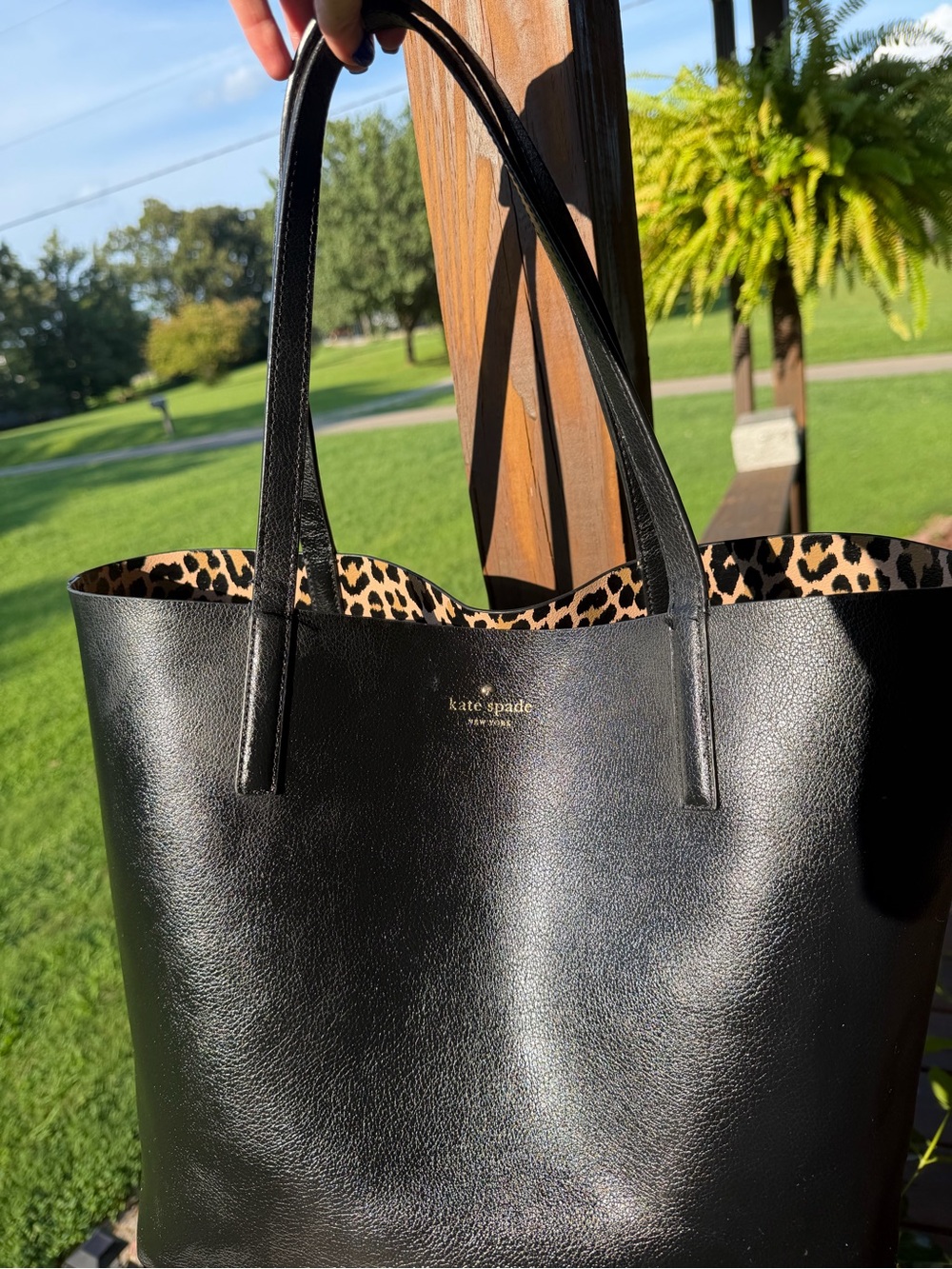 Kate Spade reversible Black Leather/ leopard print tote.